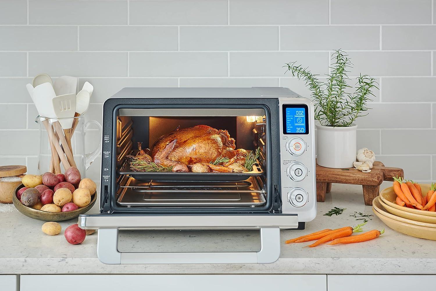 imageDeLonghi 10in1 Digital AirFryer 24L True Convection Toaster Oven with Internal Light Grills Broils Bakes Roasts Reheats Preset for Cookie ampamp Pizza 1800Watts Stainless Steel24L